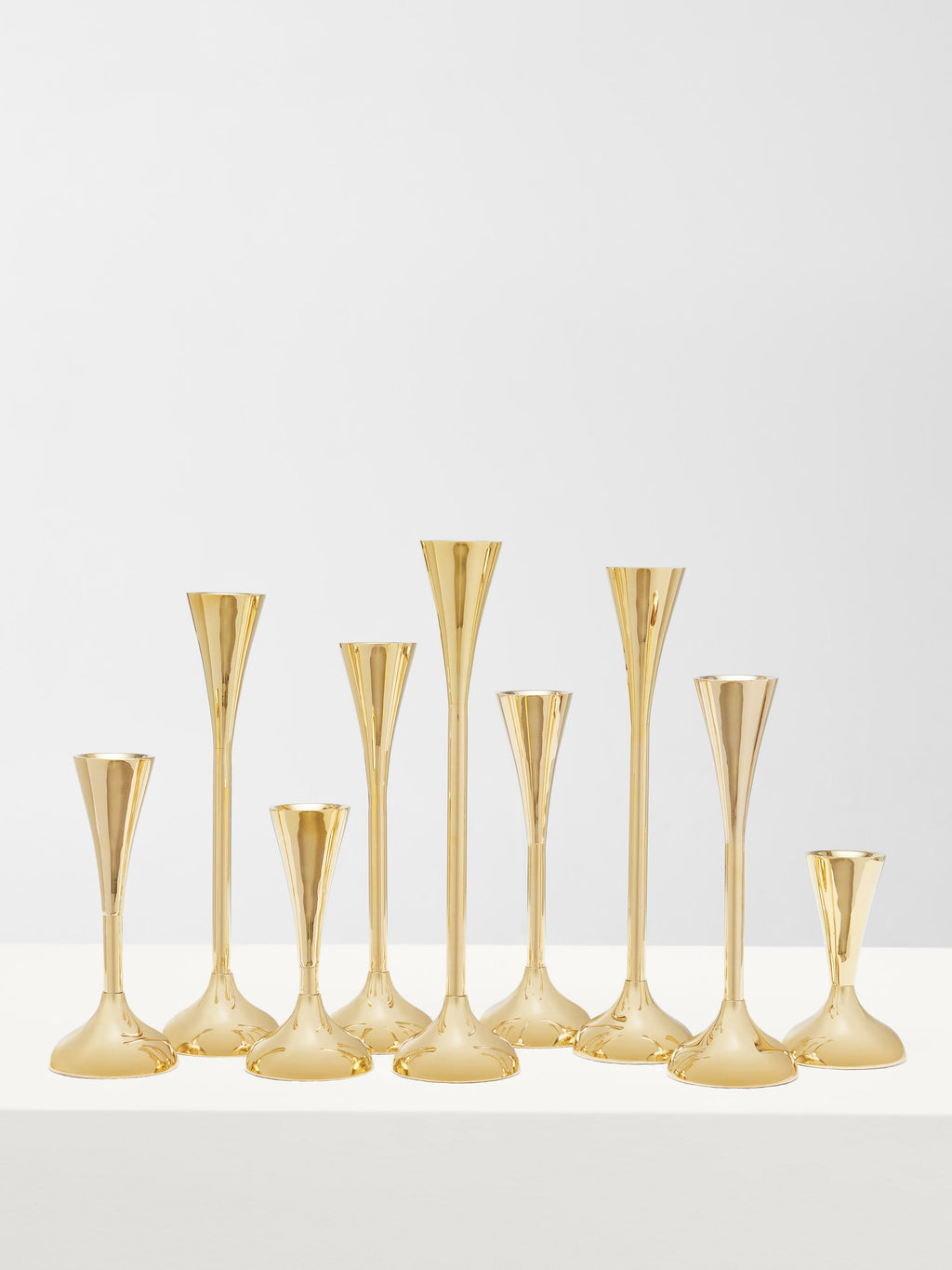 Brass | Set of Nine Drip Candleholders
